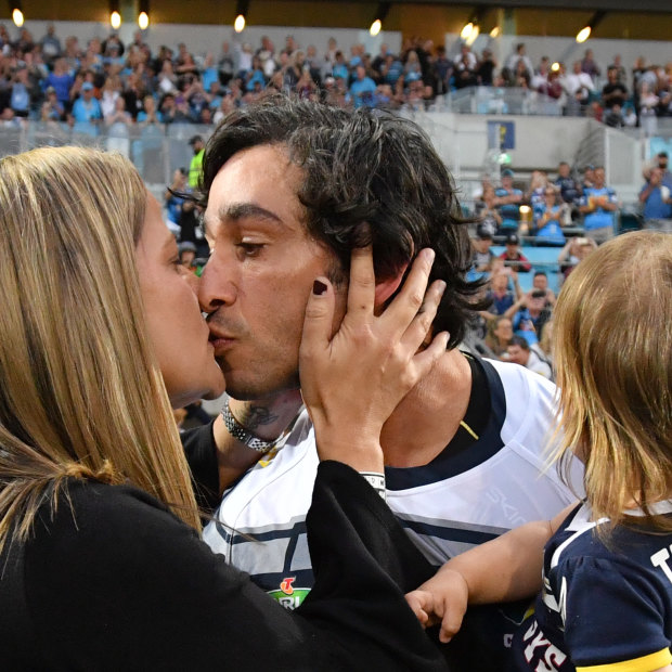 Sealed with a kiss: Thurston with his wife Samantha before his final match.