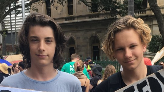 Hundreds ditch school for Brisbane rally to demand climate action