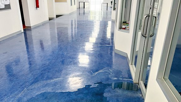 Collingwood College's top floor has been condemned after extensive water damage, including a concrete roof falling from the concrete ceiling into a classroom.