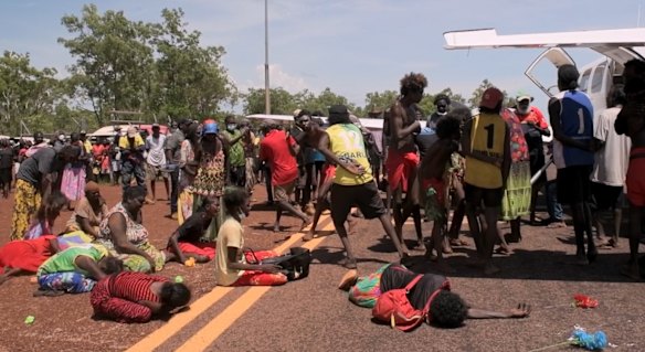 One of the dances paying tribute to David Gulpilil as his coffin was taken from Darwin by plane.