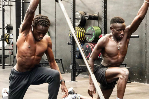 Former housemates Joe Deng (left) and Peter Bol train together in Melbourne.