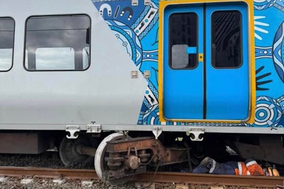 A photo shows the bogie twisted out from underneath the carriage.  