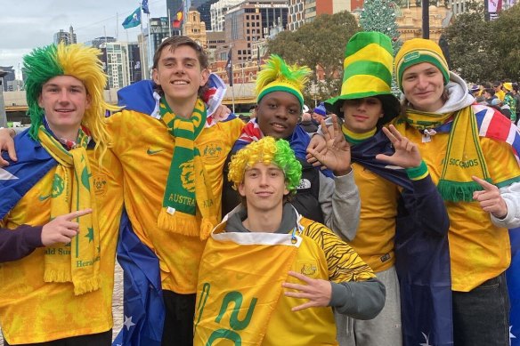 Elliott Bartley, Liam Huntington, Jordan Pisak, Isaac Njovu, Jai Luzaic and Oscar Black at Fed Square on Wednesday morning to cheer on the Socceroos.