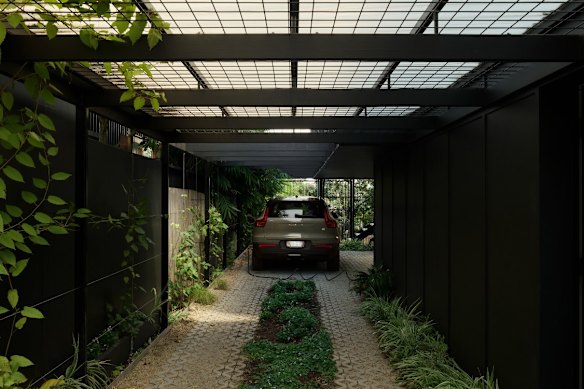 The carport nods to undercroft spaces familiar in older Queensland homes. 