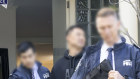AFP arrest one man in Melbourne’s Glen Iris believed to be former ANZ employee Dang Wing.