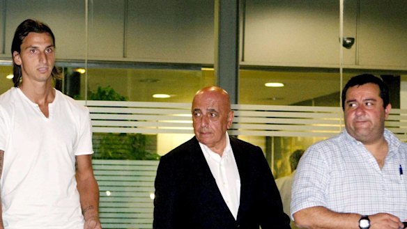 Glory target: Zlatan Ibrahimovic (left) with his agent Mino Raiola (far right). 