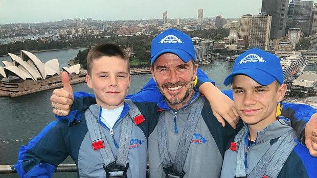 David Beckham with sons Cruz and Romeo climbing the Sydney Harbour Bridge on Wednesday.