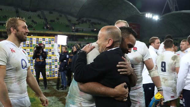 Eddie Jones hugs Billy Vunipola after England's series win over Australia. 
