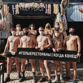 Russian restaurant staff get naked to protest against their lack of wages during the pandemic.