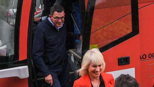 Premier Daniel Andrews and wife Cath Andrews get off Labor’s “big red bus” in Ballarat East for the first official day of the 2022 election campaign.