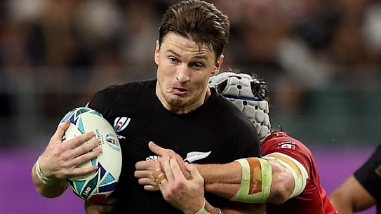 All Black Beauden Barrett is tackled.