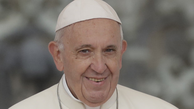 Pope Francis arrives for his weekly general audience, in St Peter's Square.