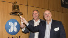 Booktopia co-founders Tony Nash, left, and Steve Traurig ringing the bell at the online book retailer's ASX listing.