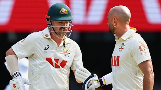Travis Head, left, talks to Jake Weatherald during the second Test.