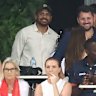 Rioli (centre) watched on at TIO Stadium in Darwin as the Suns took on the Hawks.