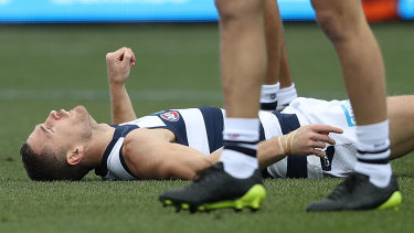 Geelong skipper Joel Selwood is knocked out in a collision during a 2017 match against Fremantle.