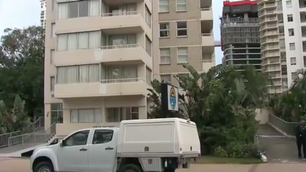 Police at the Gold Coast high-rise on Saturday after the teenager's fatal fall.