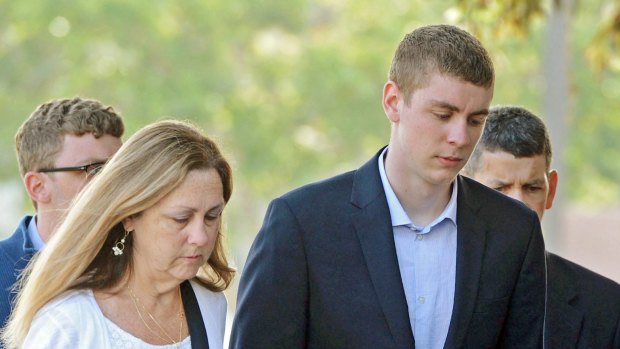 Brock Turner, right, makes his way into the Santa Clara Superior Courthouse in Palo Alto, California in 2016.