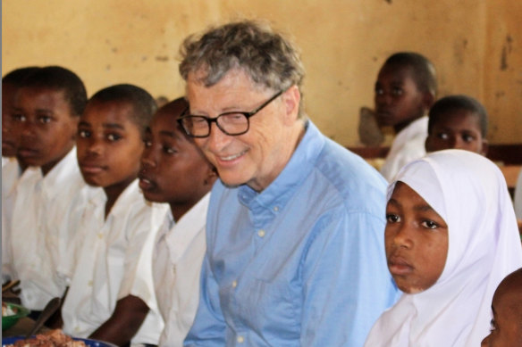 Bill Gates in Tanzania in 2017.  At such places, he says, “I wish others could come along and get to meet the people I get to meet.”
