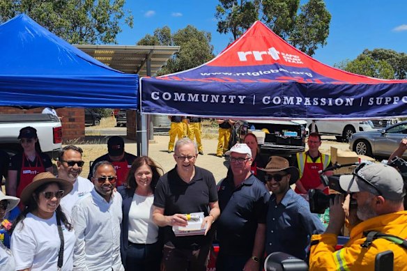 Anthony Albanese with members of the Rapid Relief Team, the charity of the Plymouth Brethren Christian Church, formerly known as the Exclusive Brethren in January 2026.