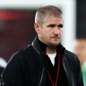 Wanderers coach Carl Robinson and Graham Dorrans react at full-time after losing to the Phoenix at Bankwest Stadium.