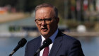 Prime Minister Anthony Albanese speaks during the flag raising and citizenship ceremony at Rond Terrace in Canberra on Thursday 26 January 2023. fedpol Photo: Alex Ellinghausen