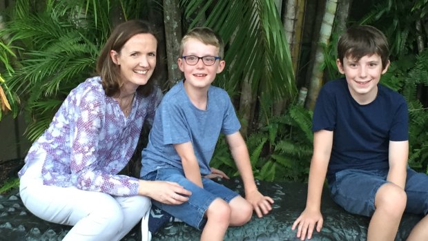 Tom Gray, with his mother Carly and brother Ben, in Cairns, just after he was diagnosed with DIPG.