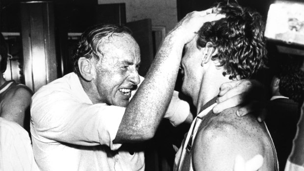 The coaching great celebrates a win during his North Melbourne days in 1985.