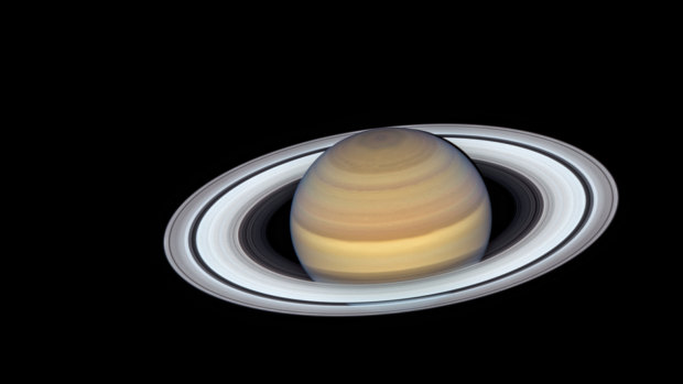 The latest view of Saturn from NASA's Hubble Space Telescope captures exquisite details of the planet's ring system - making it look like a vinyl record.