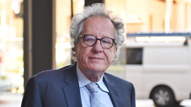 Geoffrey Rush leaves the Supreme Court.
