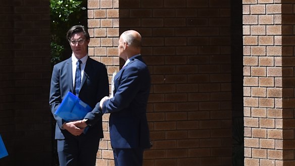 Lee Headland and his lawyer outside court.