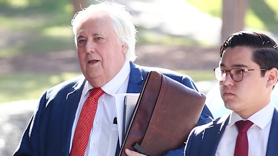 Clive Palmer shares a love of long red ties with Donald Trump.