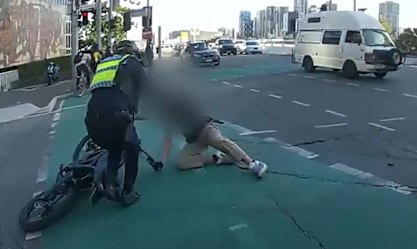 Officers allege the 19-year-old was seen riding an illegal bike down Elizabeth Street in Brisbane.