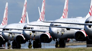Grounded Virgin Australia planes parked at Brisbane Airport.