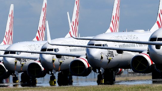 Grounded Virgin Australia planes parked at Brisbane Airport.