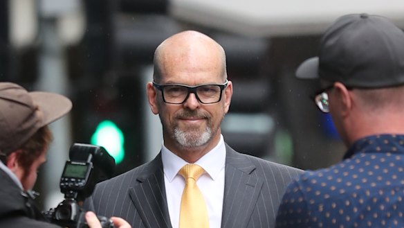 Simon Overland outside the royal commission