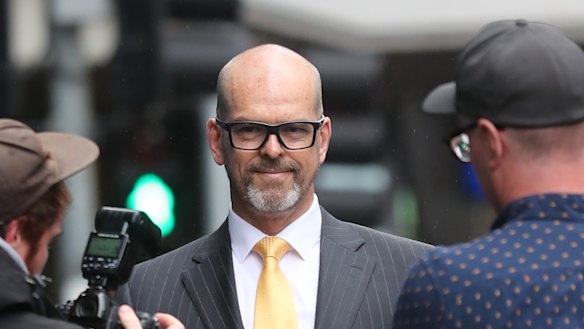 Simon Overland outside the royal commission