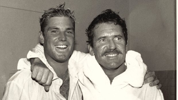 A national hero is born: Shane Warne with Allan Border.