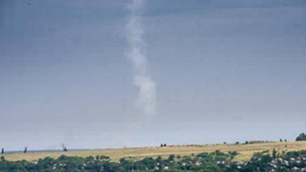 The trail of smoke left by a missile after it was fired by a the Buk-M1 system at MH17 by pro-Russia rebels, according to the Ukraine government.