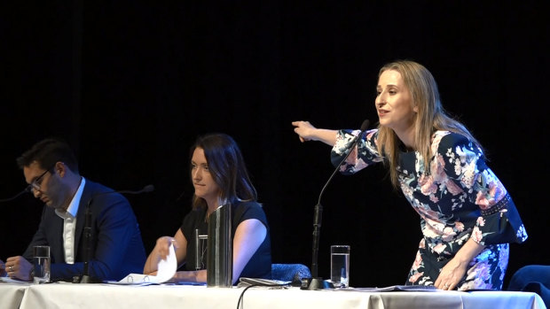 Pointing the finger: Liberal Kate Ashmor (standing) The Greens' Steph Hodgins-May and Labor's Josh Burns.