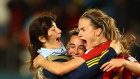 Spain’s Irene Paredes and teammates celebrate after beating Sweden to advance to the World Cup final.