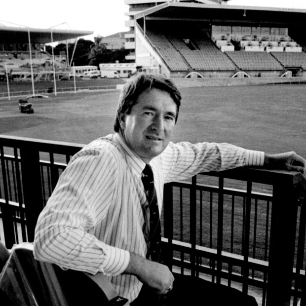 Then-Brisbane Bears CEO Andrew Ireland, with the old western stand to the left, pictured at the Gabba in 1993.