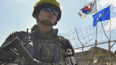 A South Korean soldier stands guard inside the Demilitarized Zone.