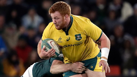 Accidental tourist: Harry Johnson-Holmes is tackled by Pieter-Steph du Toit after coming on for an unexpected debut. 