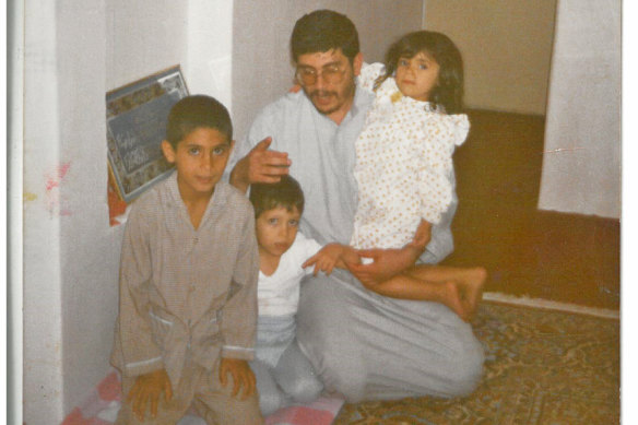 From left: Sami, his brother Ali, his father and his sister Mona at home in Iran’s Khuzestan Province.