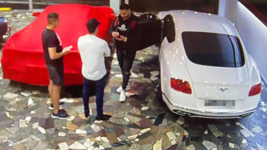 CCTV captures Mostafa Baluch collecting a Bentley from a luxury car dealership in Woolloomooloo in May.