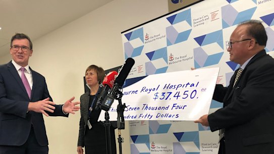 Acting Multicultural Affairs Minister Alan Tudge (left) and Di Sanh Duong (right) in June.