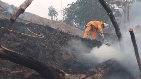 The Allandale Rural Fire Brigade dampening down bushfires in the Scenic Rim.