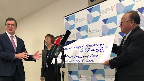 Acting Immigration Minister Alan Tudge and Di Sanh Duong in June.