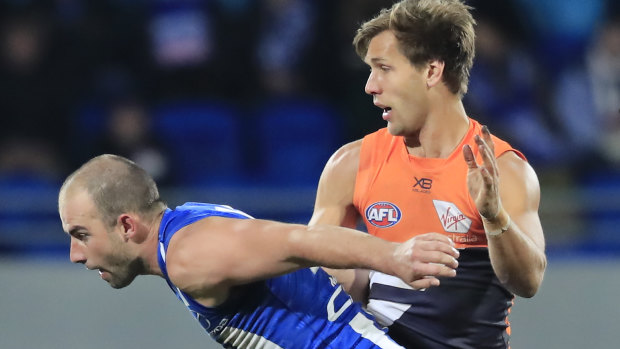 North Melbourne's Ben Cunnington and GWS Giants' Matt de Boer are likely to go head to head again this week.